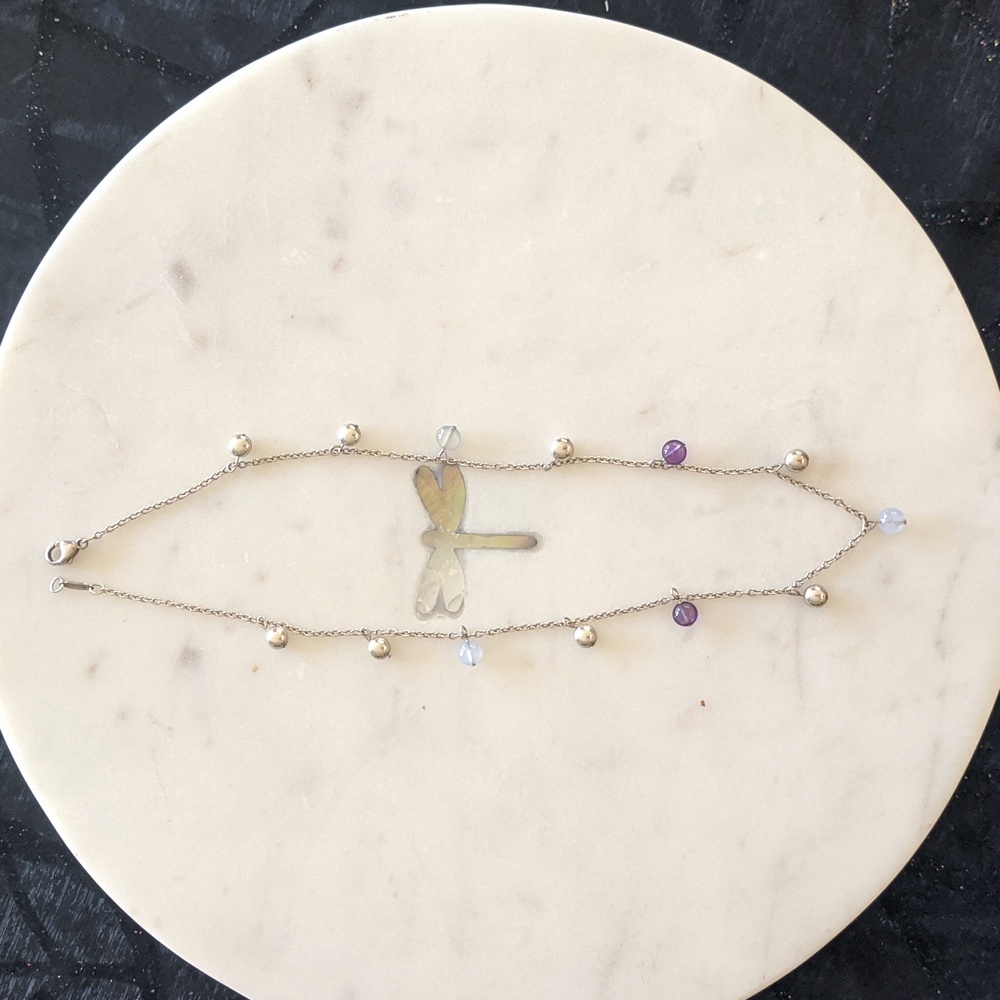 Tiffany & Co. silver necklace with moonstone and amethyst drops.